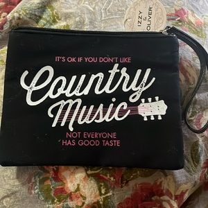 NWT wristlet  ok if you don't like country music not everyone has good taste
